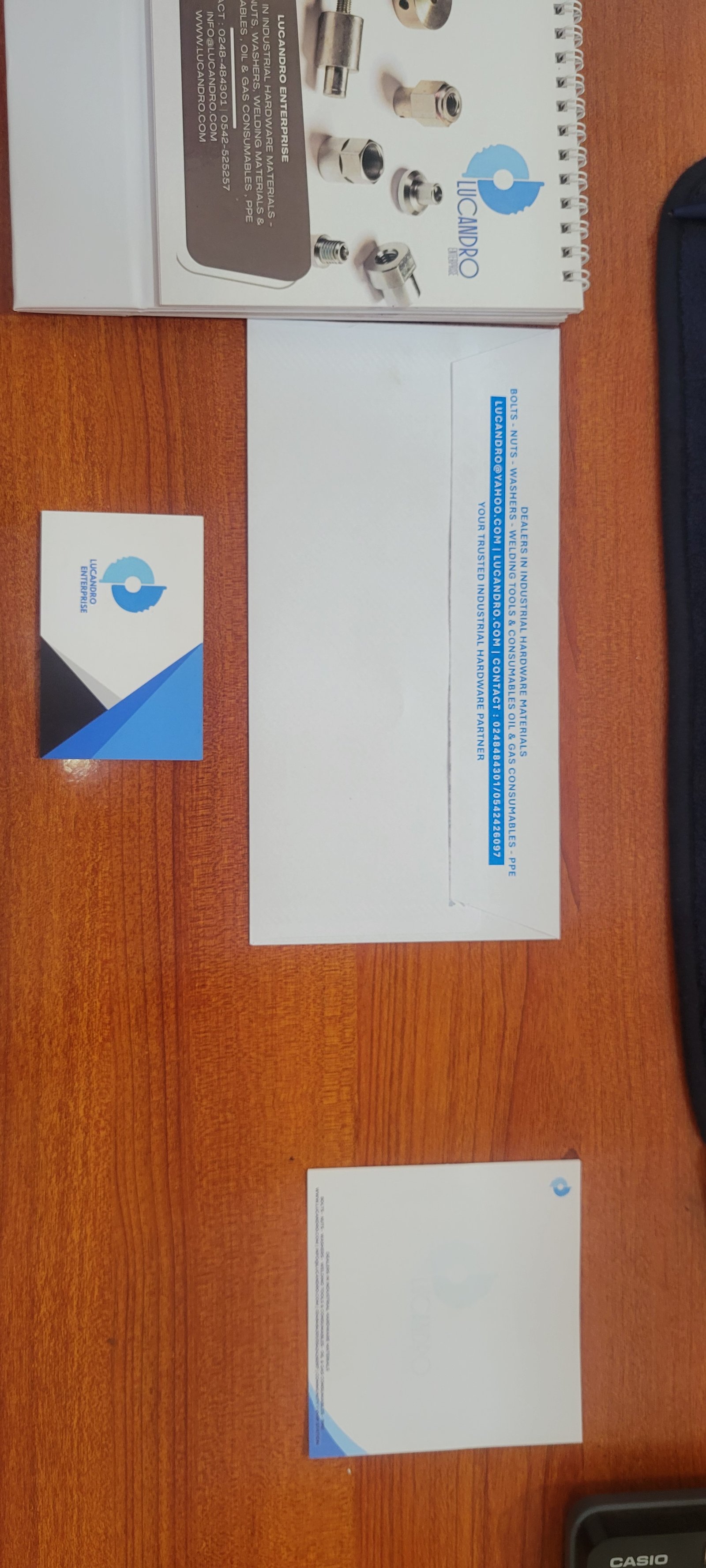 Lucandro branded desk and stationery materials